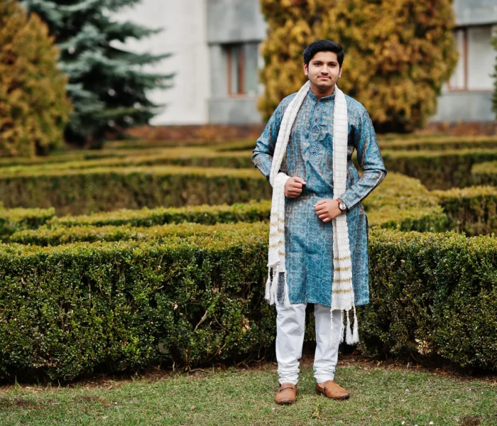indian-man-wear-traditional-clothes-with-white-scarf-posed-outdoor-against-green-bushes-park indian-man-wear-traditional-clothes-with-white-scarf-posed-outdoor-against-green-bushes-park